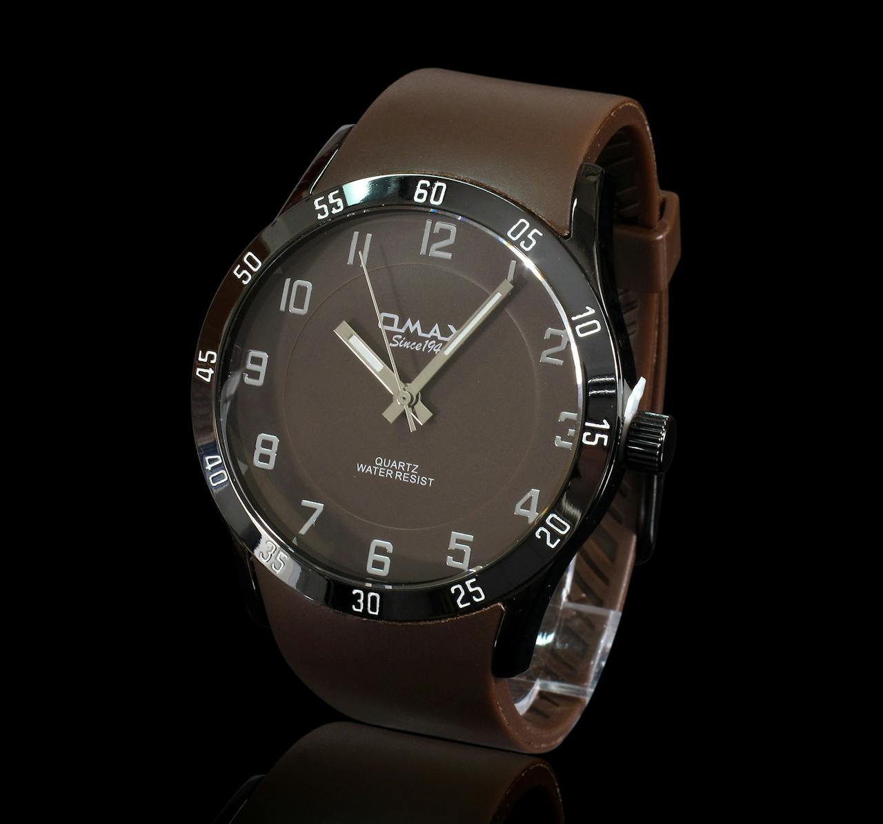 Stylish brown leather wristwatch with a sleek design and visible hour markers on a black background.